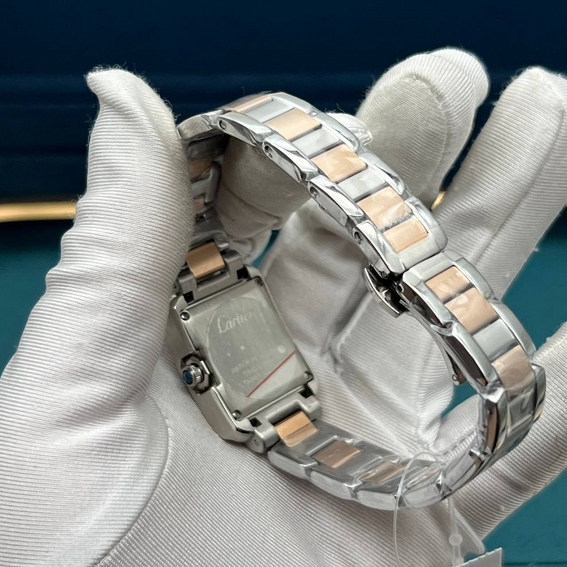 Cartier Tank Francaise 20 мм: корпус 316L, серебристый циферблат и двухцветный браслет из стали 316L