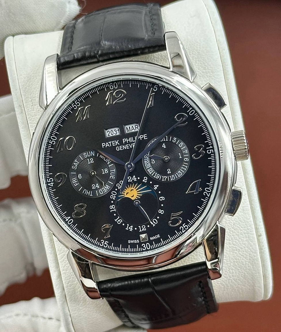 Patek Philippe Grand Complications 45 мм: золотистый солнечный мотив на чёрном циферблате и фактурный ремешок